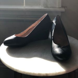 Bionic black wedge heels